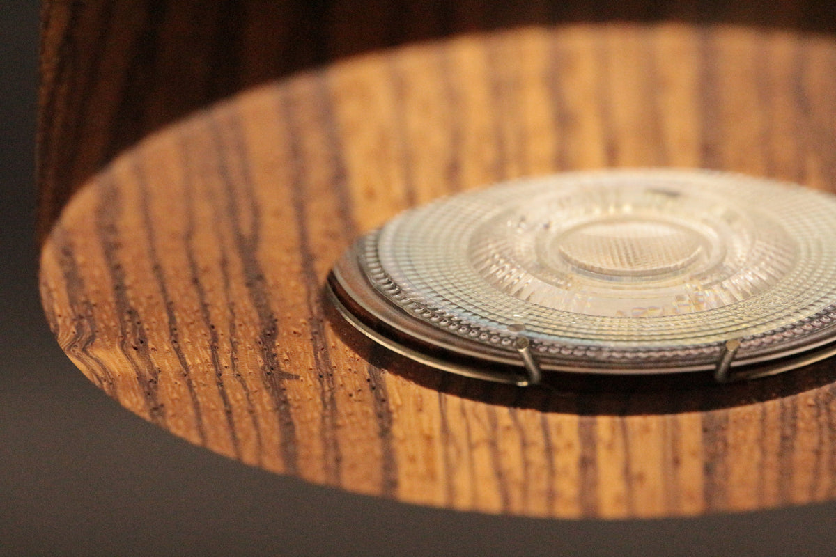 wood led ceiling spotlight zebrano mega close up view showing contrasting natural grain lines